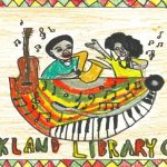 Child's artwork depicting two African American artists performing music.