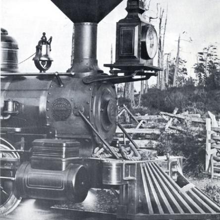 Cover of Short and Narrow Rails magazine, featuring a photograph of a train engine.